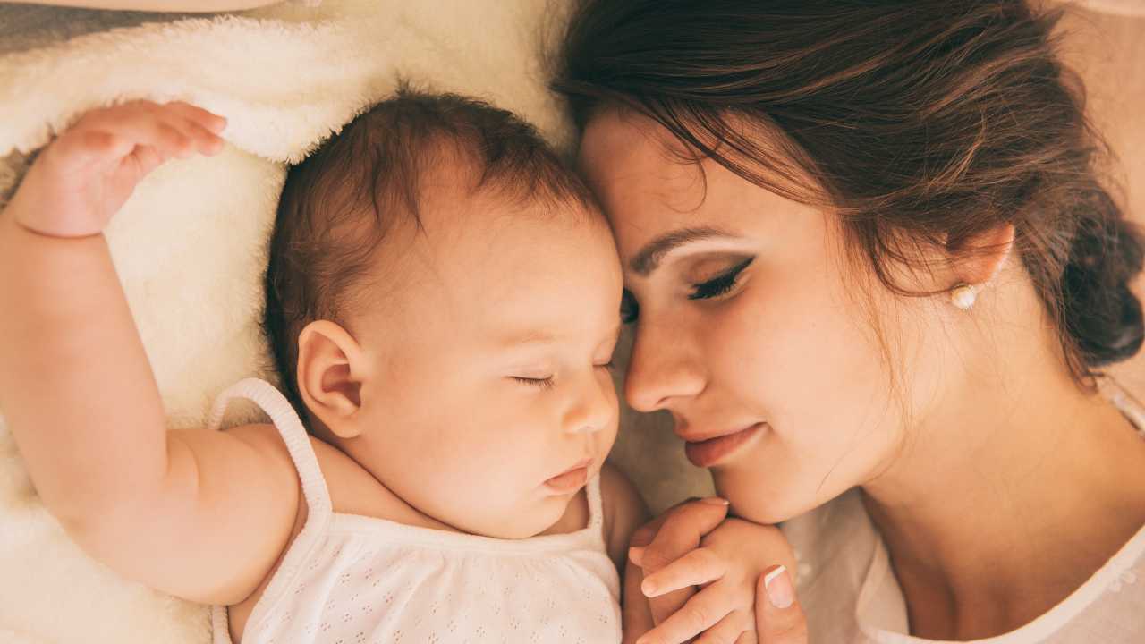 mum and baby sleeping through the night