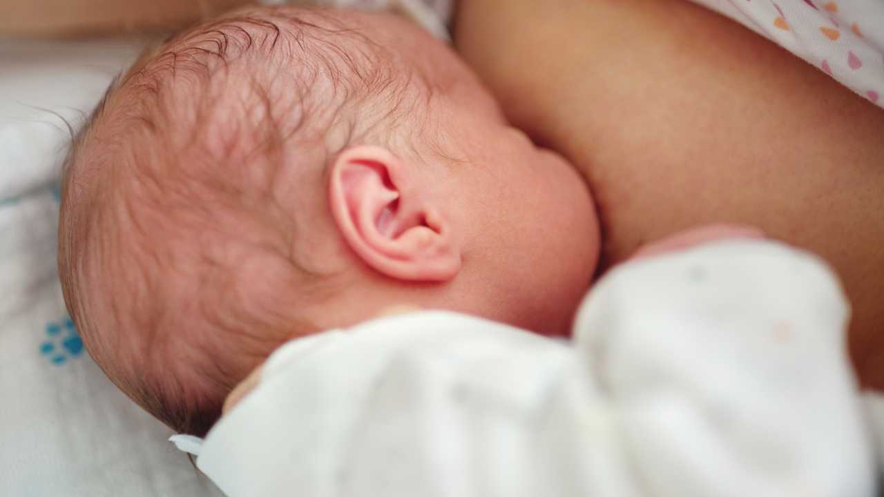 baby co-sleeping and latched on all night