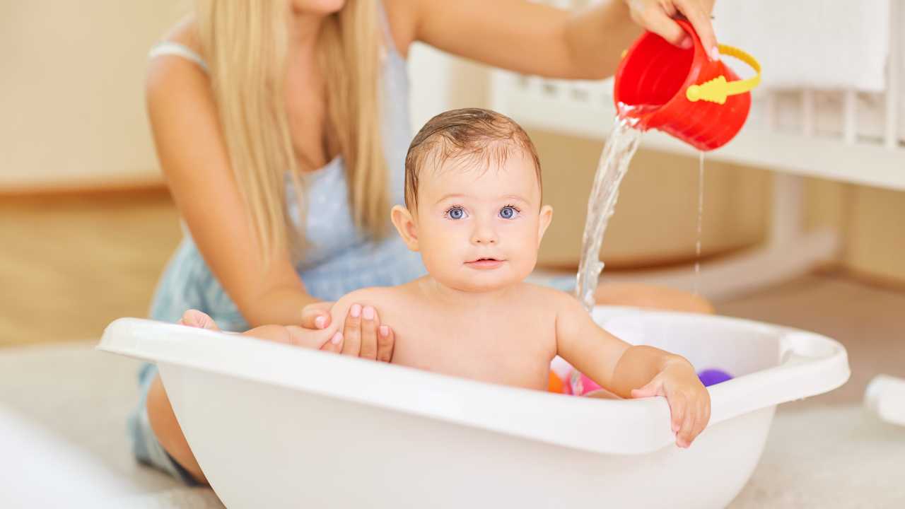 baby having a bath at bedtime
