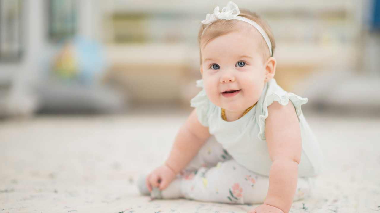 baby sitting on floor