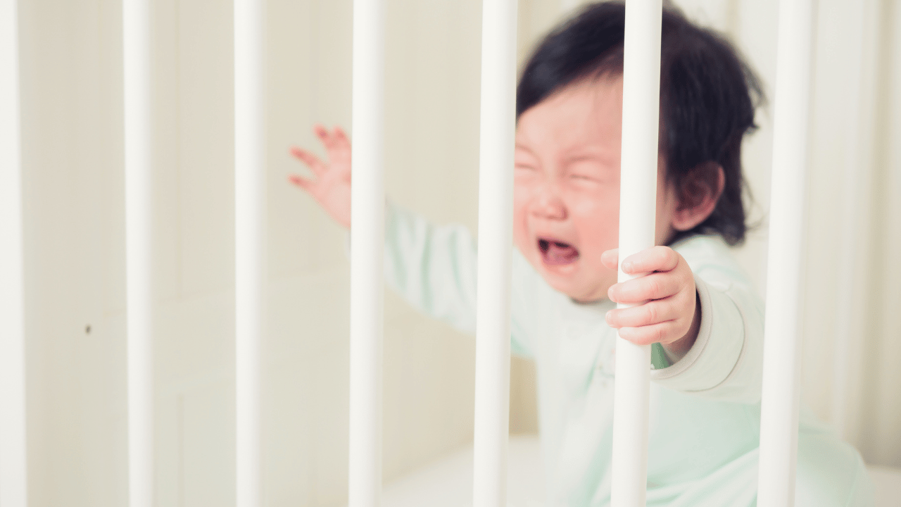 baby crying in cot
